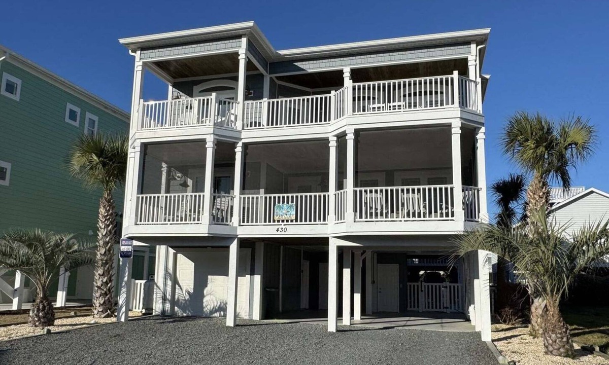 Sunset Beach House | Discover The Lazy Pelican: a spacious 5BR home in Sunset Beach, perfect for family getaways.