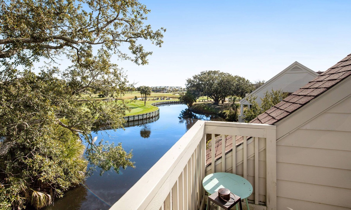 Spinnaker Beachhouses Villa | Dog-friendly villa near beach with pool access, patio, central AC & washer/dryer