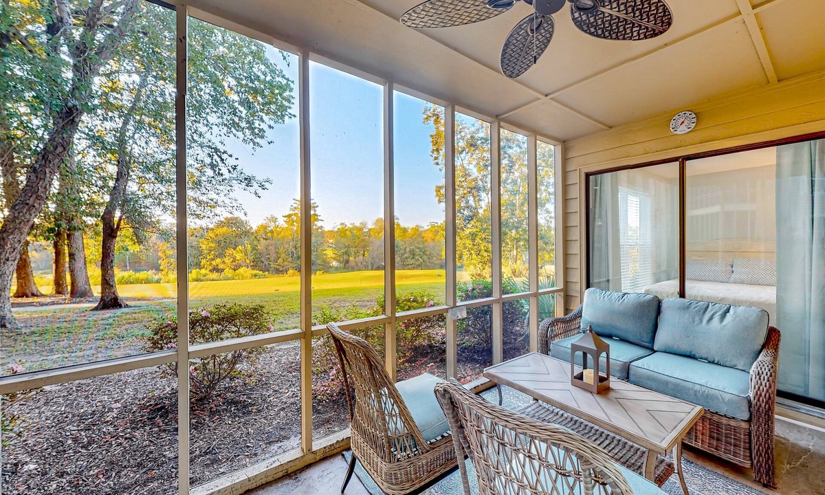 Sea Trail Condo | Ev's Escape,201A: Modern condo with sunroom - dog and snowbird-friendly