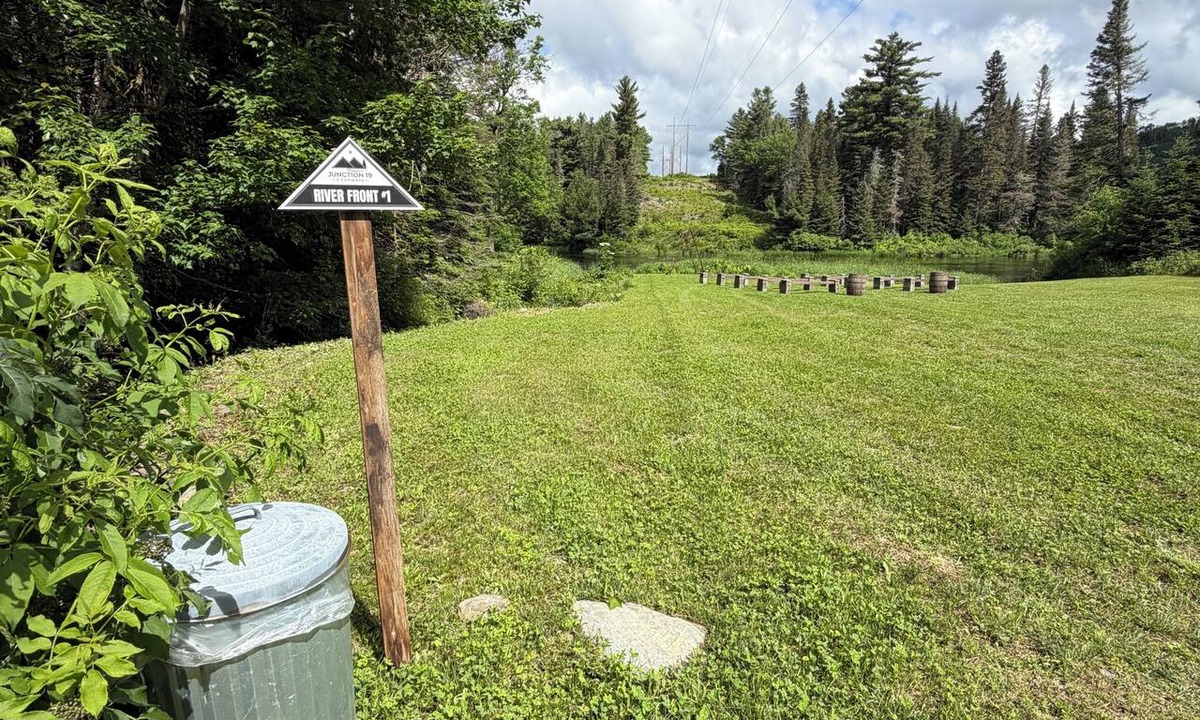 Fort Kent Mills RV Rental | Junction 19 & Co. Riverfront Campsite #1 - Cozy & Tranquil - In Town & On Trails