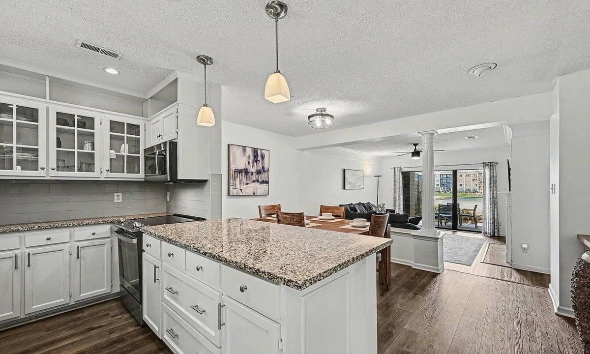 University Place Condo | Lake view 3-bedroom condo with AC near UNC in Charlotte. 5 minute walk to Lynx.