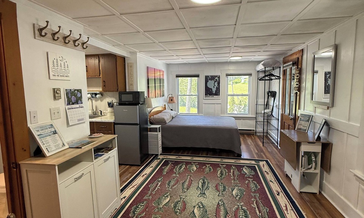 Standish Condo | Sebago Lake studio-style condo with enclosed sunroom and sunset views