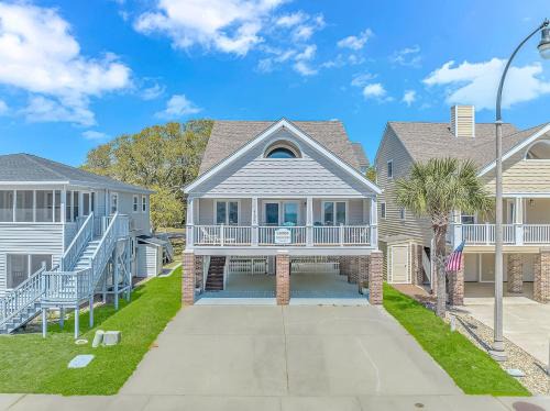 Windy Hill House | Stunning and Spacious 3 Bedroom House with Fireplace! Steps From the Ocean- Memory at the Sea!