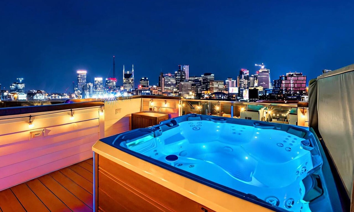 Katie Hill Neighborhood House | Summer rooftop hot tub, game room, skyline views near Broadway