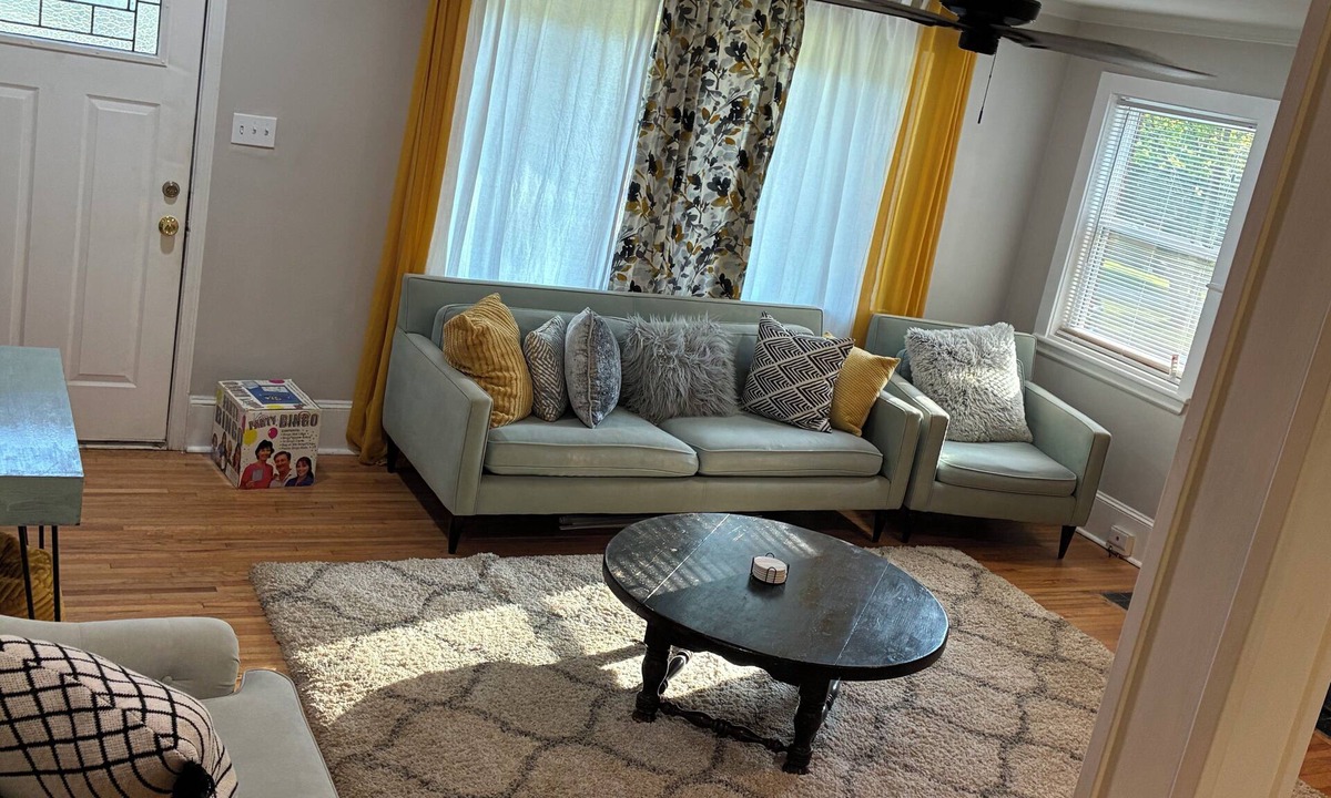 Toddville Road House | West side gem on a half-acre lot. Sunroom for indoor/outdoor living. Book today!