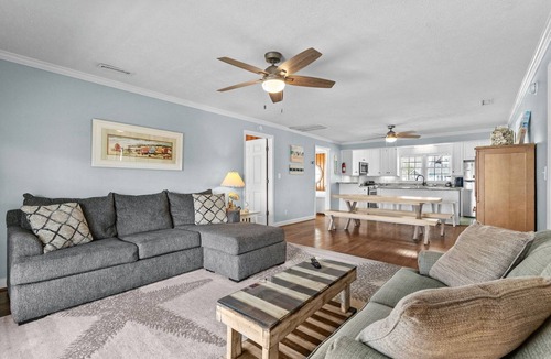 Cherry Grove Beach House | 10% off 3-7 nights Aug-Oct. Pet friendly 4BR 2BA on channel. Fenced yard