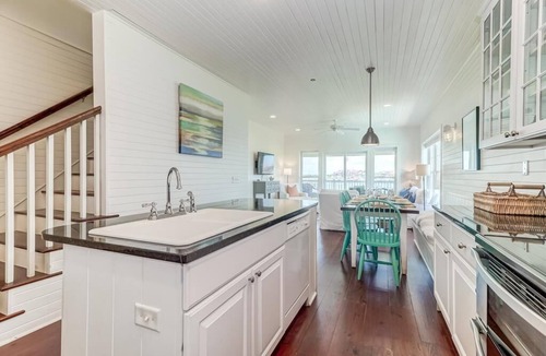Waters Edge House | 124 Waters Edge! Riverfront Town Home! Screened porch, Community Pool, & Fishing Dock!