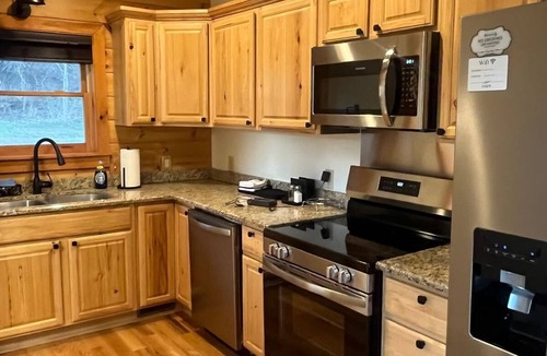 Rural Retreat Cabin | 2-bedroom cabin located on a working bee farm and stocked trout stream.