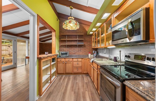 Easley House | 3-bedroom furnished retro rancher in Easley with fenced yard