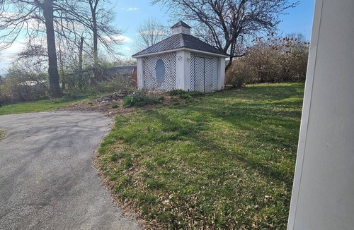 Hilander Park House | 4-bed house w/new HVAC, fiber internet, and private wooded acre in Bristol
