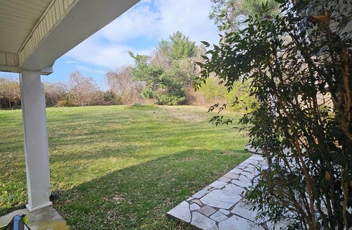 Hilander Park House | 4-bed house w/new HVAC, fiber internet, and private wooded acre in Bristol
