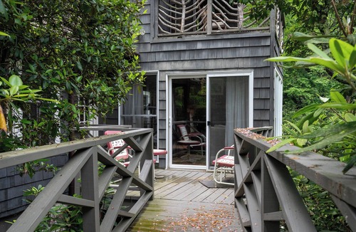 Mirror Lake Cabin | A 100-Year-Old Mill. A River That Wraps the House. A Water Wheel Still Turning | The Millhouse