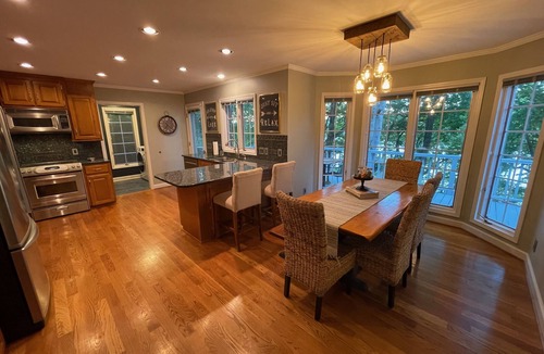 New London House | A Spirited Retreat Lakefront w/Dock, Theatre & Gameroom!
