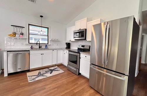 Colington Harbour House | Amazing sunsets, hot tub, community pool, 3 bed 2 bath. Dog friendly!