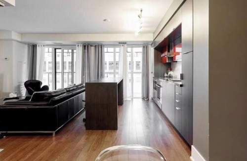 Downtown Toronto Apartment | Balcony 1BR Toronto Suite with Workspace & Wi-Fi
