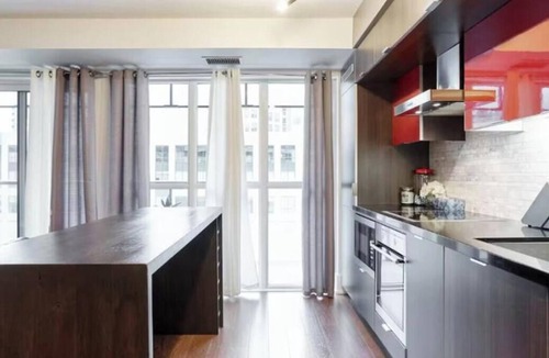 Downtown Toronto Apartment | Balcony 1BR Toronto Suite with Workspace & Wi-Fi