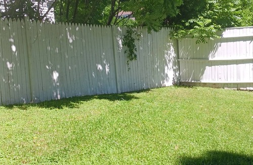 Sabattus House | Beautifully remodeled first floor of a duplex home, surrounded by privacy fence