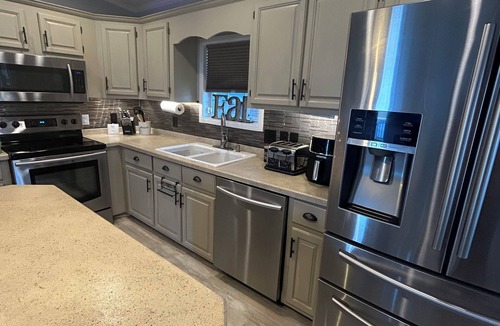 New London House | Bigfoot’s Badin Retreat in Badin Shores Resort - Golf Cart - Family Fun