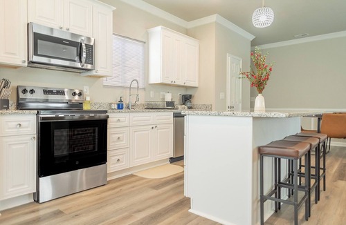 Paw Creek House | Brand New 3BR - Patio - Fast WiFi+Workspace - Near Airport & Whitewater Center