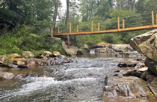 Deep Gap RV Rental | Campsite with Private Tree House Gazebo on a trout creek