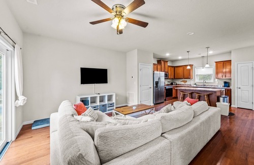 Colington Harbour House | Canal-view, dog-friendly home with private hot tub, deck & grill - near beach
