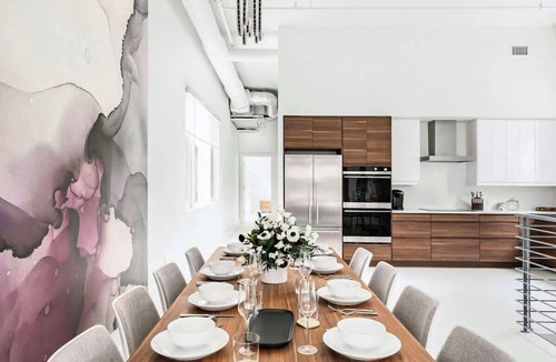 Arts District Condo | Charming condo with central AC, full kitchen, & tasteful decor