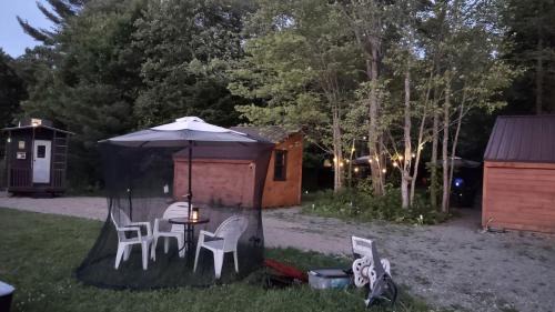 Lincoln House | Charming Off-Grid Glamping Cabins Near Lakes & Kayaking in Lincoln, Maine