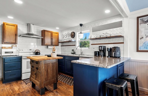Brigands' Bay Cottage | Charming soundfront beach box with hot tub, game room, and stunning sunsets!