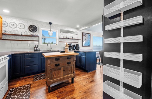 Brigands' Bay Cottage | Charming soundfront beach box with hot tub, game room, and stunning sunsets!