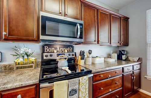 Winston - Salem House | Charming townhouse with pool, patio, central AC, & washer/dryer