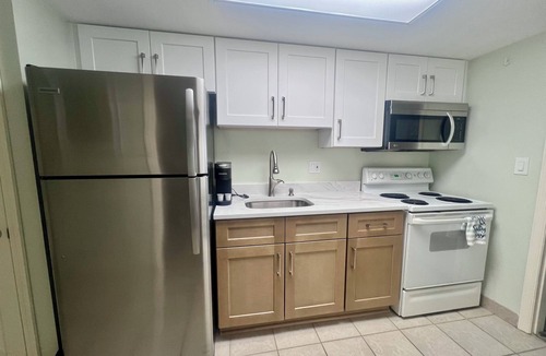 Crescent Beach Resort | Coastal Beachfront Paradise! Resort Style Amenities with a BRAND NEW KITCHEN!