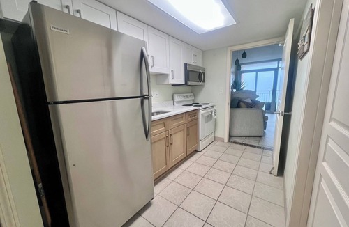 Crescent Beach Resort | Coastal Beachfront Paradise! Resort Style Amenities with a BRAND NEW KITCHEN!