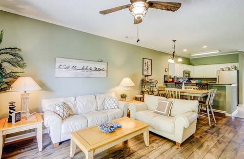 Little River House | Comfortable townhome with loft, shared pool, WiFi, AC, & W/D - near beach & golf