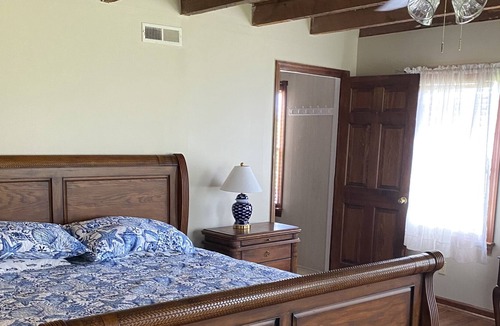 Stacy Cottage | Core Sound Waterfront Cottage with boat ramp and dock on the property.