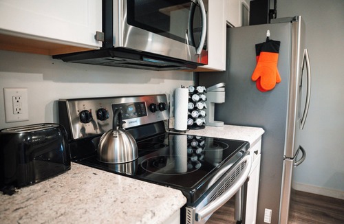 Central Cottage | Cozy Carriage House near Clemson - full kitchen, deck, fire pit, grill, and more