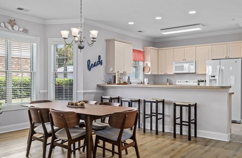 Central Myrtle Beach Condo | Cozy Condo/Pool/Workspace/Dogs Stay for Free!