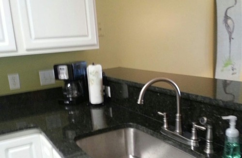 Pawleys Island Condo | Cozy King Condo on True Blue Golf Club steps from pool hot tub + State Park Pass