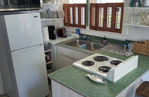 Crescent Beach House | Cozy Vintage Artist Cottage. 5-minute walk to the beach, 2BR/1 BA. Pets OK,