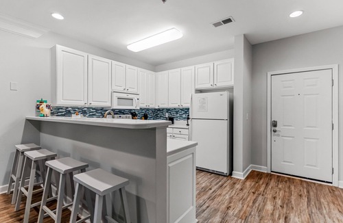 Calabash House | Crow Creek Retreat: Golf-course-front villa at Crow Creek with screened porch and washer/dryer