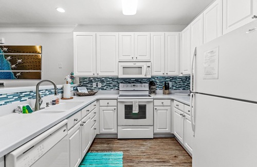 Calabash House | Crow Creek Retreat: Golf-course-front villa at Crow Creek with screened porch and washer/dryer
