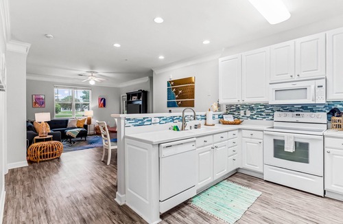 Calabash House | Crow Creek Retreat: Golf-course-front villa at Crow Creek with screened porch and washer/dryer