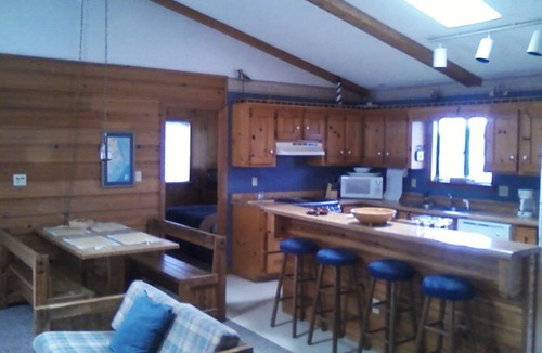 Salvo Cottage | DECK OCEAN VIEWS HOT TUB SHORT STROLL BEHIND HOUSE TO SERENE BEACH !