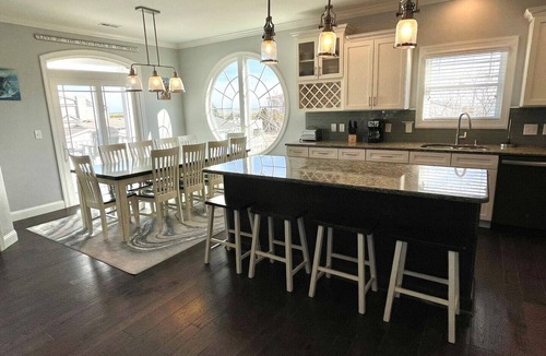 Sunset Beach House | Discover The Lazy Pelican: a spacious 5BR home in Sunset Beach, perfect for family getaways.