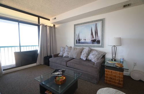 Virginia Beach Condo | Enjoy Sunrise and dolphin's swimming every morning from your personal balcony!