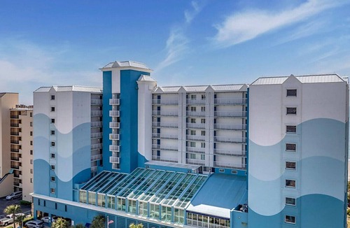 Windy Hill Condo | Enjoy the resort amenities (lazyriver) with the family in great beach 2BD condo