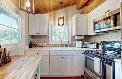 Sunset Cove Condo | Escape to Tranquility: Cozy Cabin Retreat with Dock & Outdoor Living