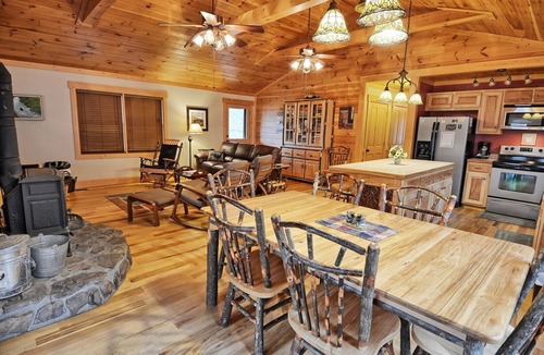 Warrensville Cabin | Experience comfort at Incommunicado in Warrensville, NC—a cozy 4-bedroom cabin for 10!