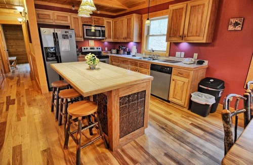 Warrensville Cabin | Experience comfort at Incommunicado in Warrensville, NC—a cozy 4-bedroom cabin for 10!