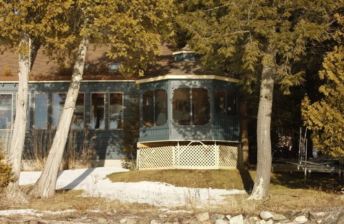 Memphremagog Regional County Municipality Ski Chalet | Exquisite lakeside retreat directly on Lake Memphrémagog offers serene getaway.