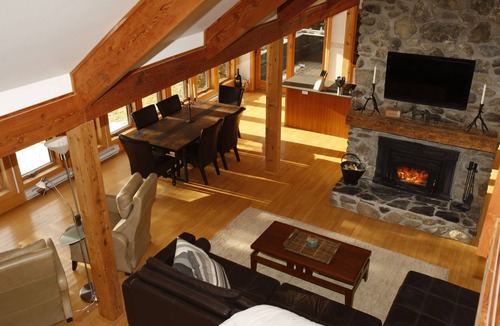 Memphremagog Regional County Municipality Ski Chalet | Exquisite lakeside retreat directly on Lake Memphrémagog offers serene getaway.